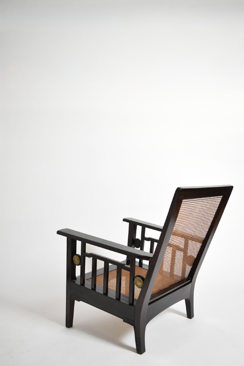Paire de fauteuils coloniaux en bois ébénisé et cannage, années 1920.-photo-1