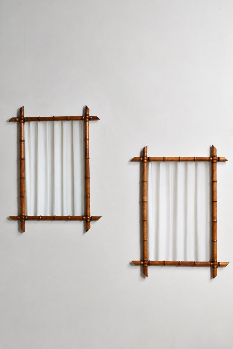 Paire de miroirs en bois façon bambou, années 1920.