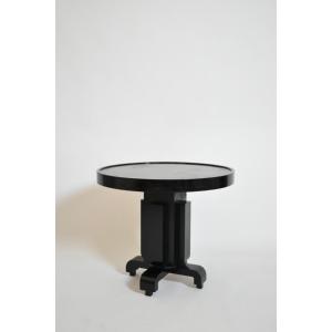 Table d’appoint ronde art déco en bois ébénisé, à motifs géométriques, années 1930.