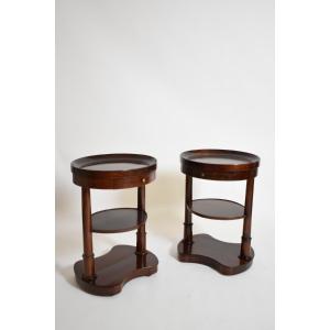 Paire de tables volantes en acajou, de forme ovale en rein, XIXᵉ siècle.