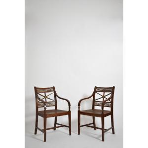 Paire de fauteuils néoclassiques en acajou et cannage, XIXe siècle.