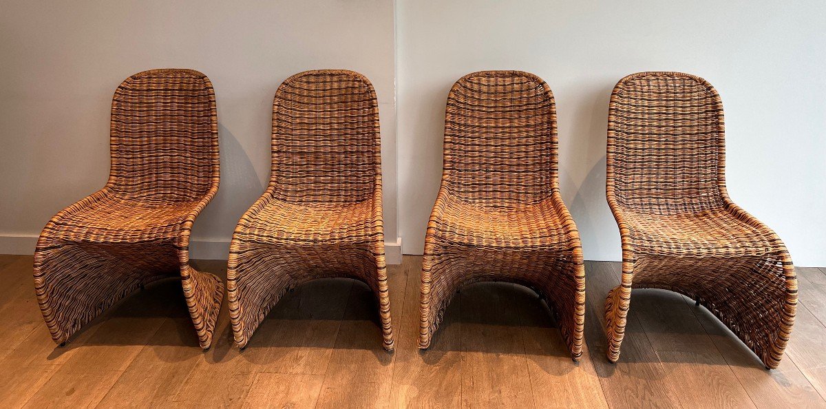 Suite Of Four Curved Rattan Chairs. French Work. Around 1970
