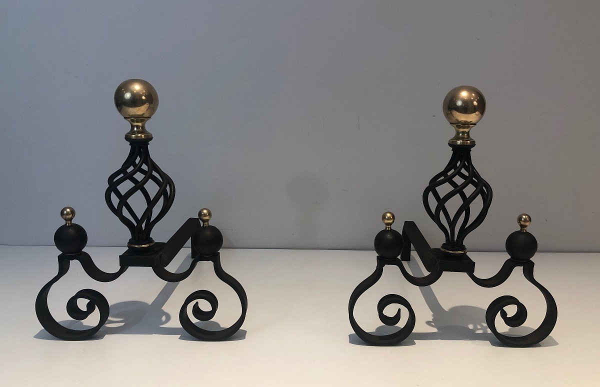 Pair Of Wrought Iron Andirons Topped With A Brass Ball. French Work. Around 1970