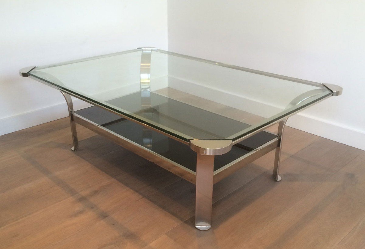 Large Design Chrome Coffee Table With Clear Glass Shelf On Top And Black Lacquered Glass Shelf On The Bottom. French Work. Circa 1970