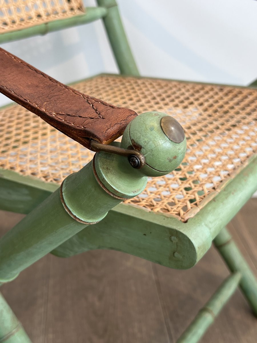 Pair Of Folding Safari Chairs In Patinated Faux Bamboo, Caned Backs And Seats And Leather Arms-photo-7