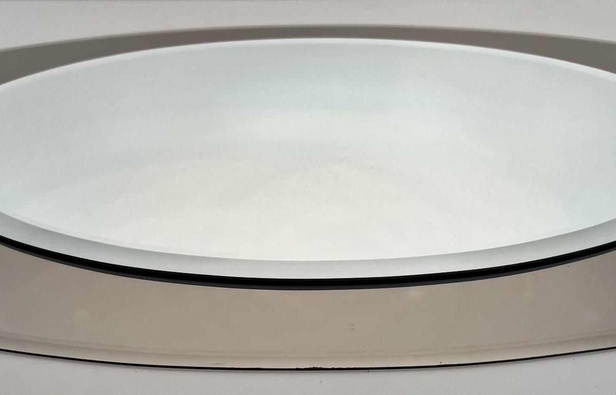 Important miroir de forme ovale à positionner horizontalement. Travail Italien de Fontana Arte.-photo-3