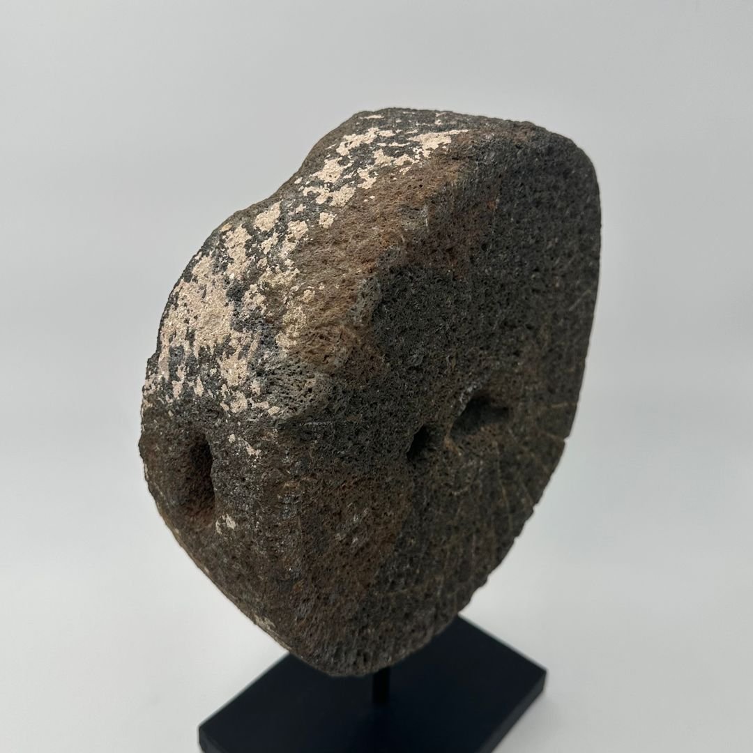 Decorative Element Made Of A Millstone On A Steel Base-photo-2