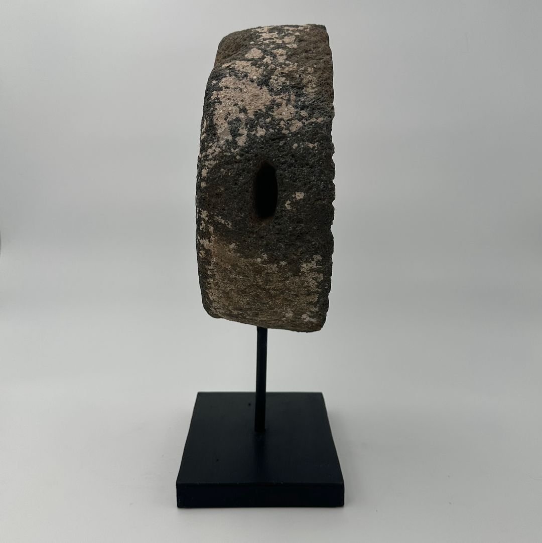Decorative Element Made Of A Millstone On A Steel Base-photo-3