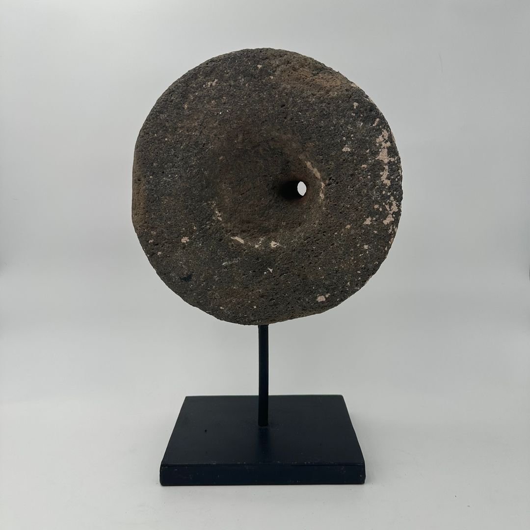 Decorative Element Made Of A Millstone On A Steel Base-photo-6