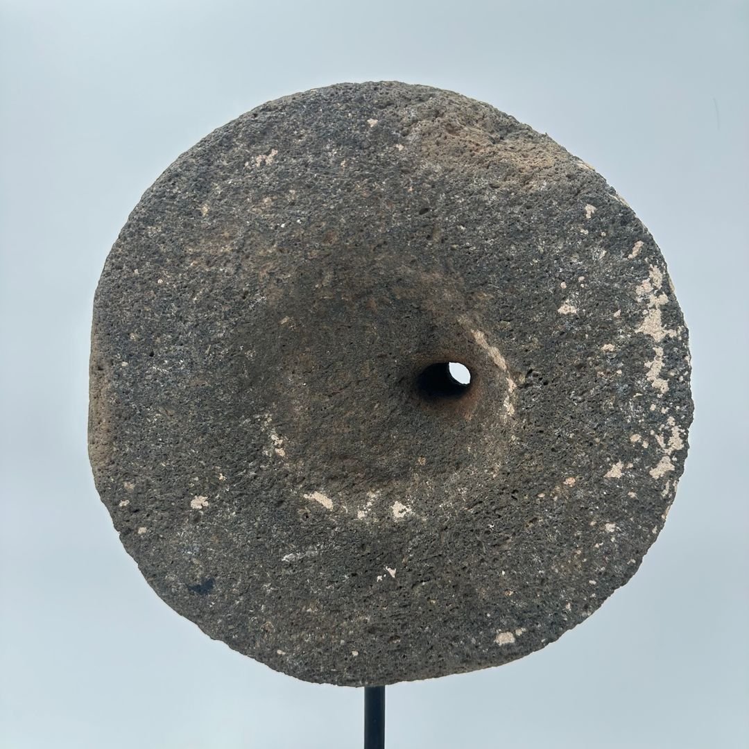 Decorative Element Made Of A Millstone On A Steel Base-photo-7