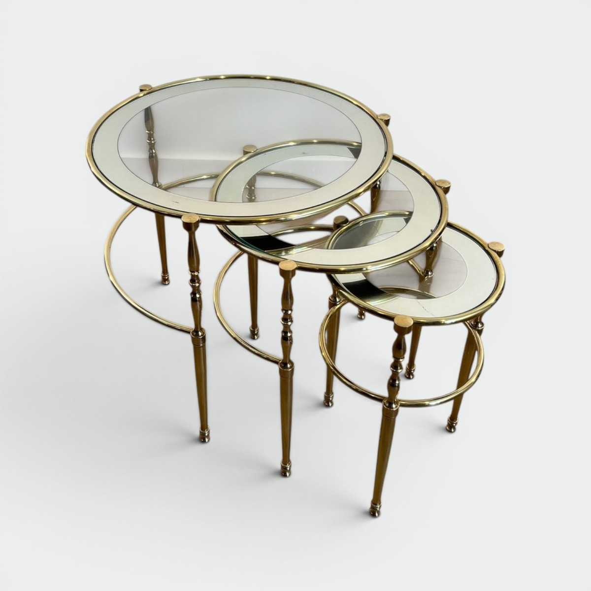 Set Of Three Round Brass Nesting Tables With Silver-rimmed Glass Tops, French Work, France, Cir