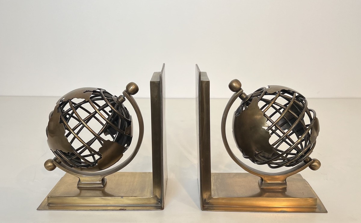 Pair Of Brass Bookends Featuring Openwork Terrestrial Globes. French Work. Circa 1970
