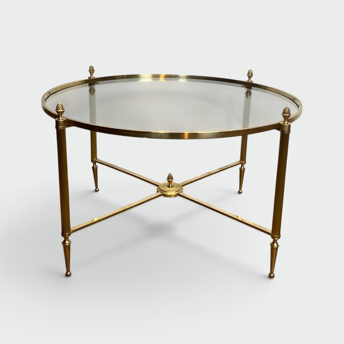 Round Neoclassical Brass Coffee Table With Fluted Uprights And Pinecone Finials. Glass. French 