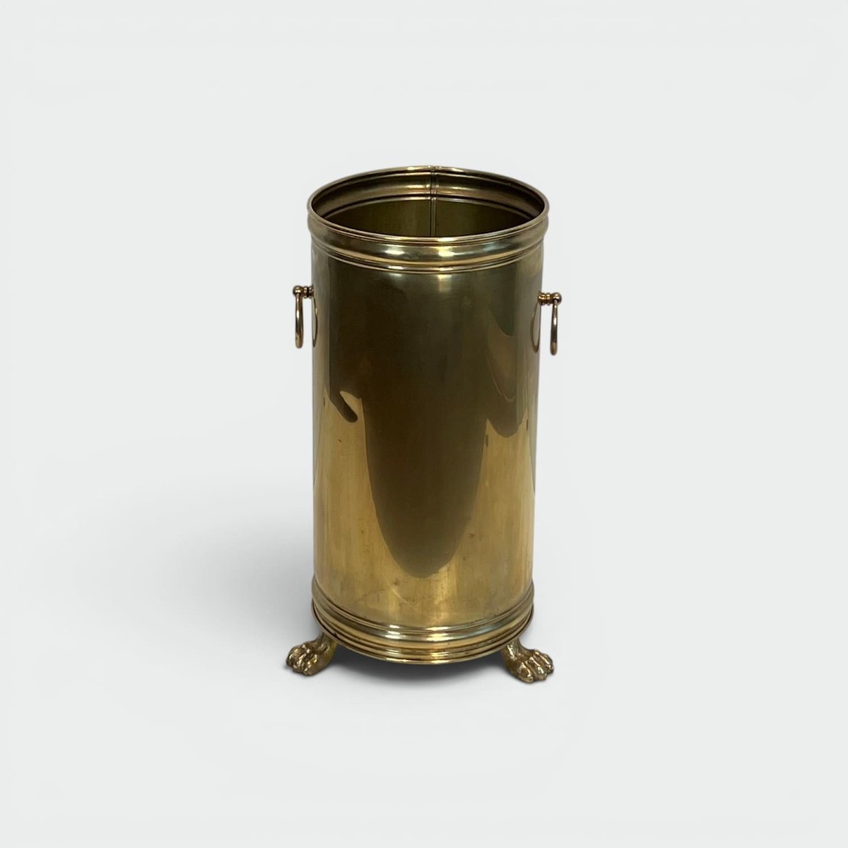 Cylindrical Brass Umbrella Stand With Ring Handles And Claw Feet. Neoclassical Style. Circa 190