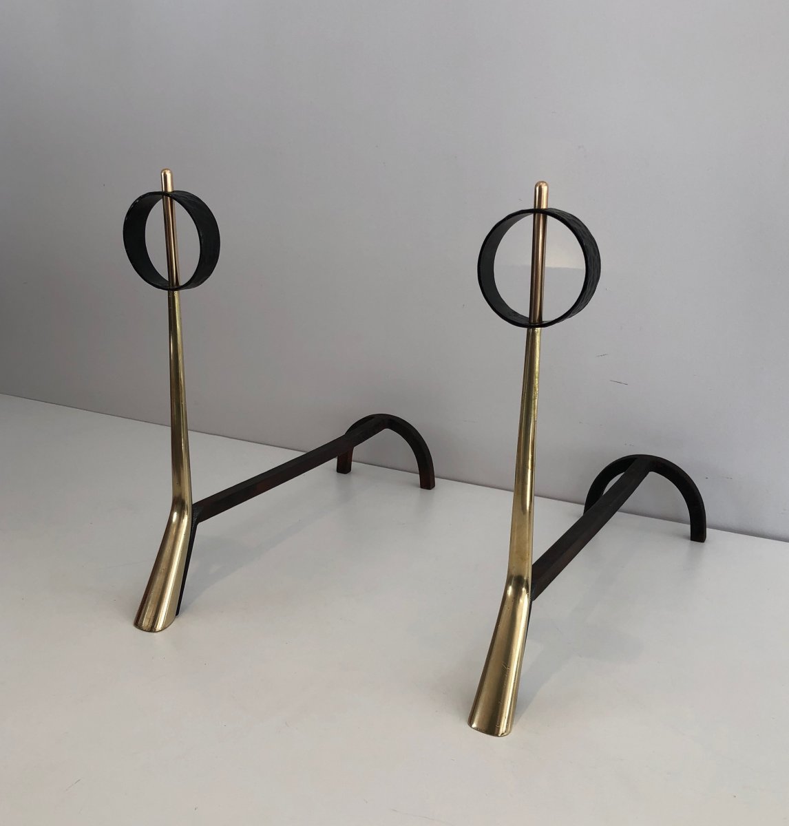 Pair Of Modernist Bronze And Wrought Iron Andirons. Italian. Circa 1950