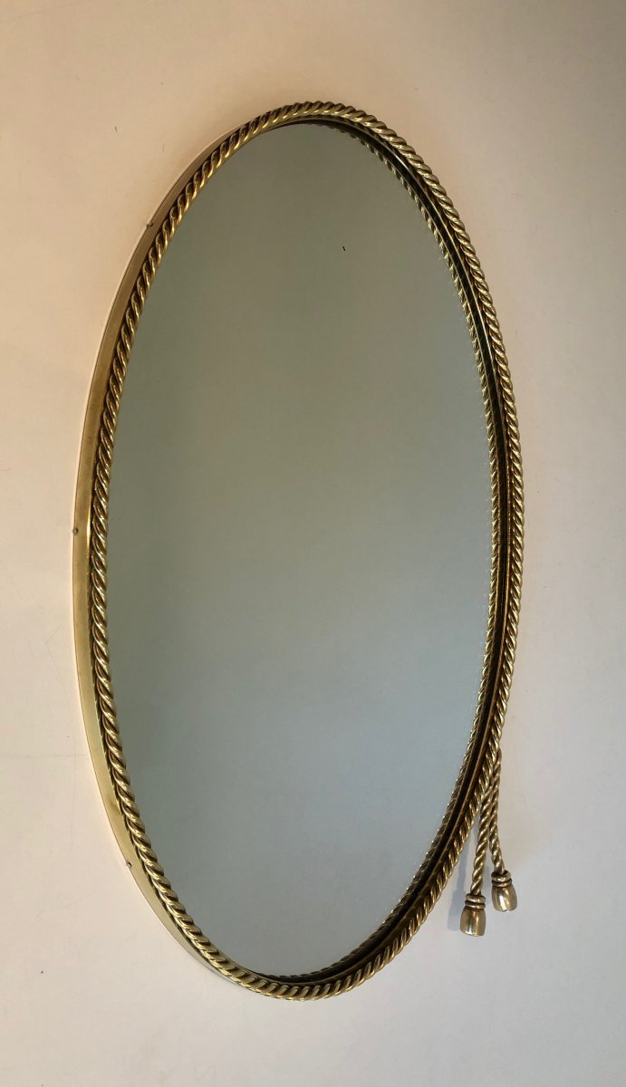 N The Style Of Maison Bagués. Oval Brass Mirror Surrounded By A Cord Decorated With 2 Pompoms. -photo-6
