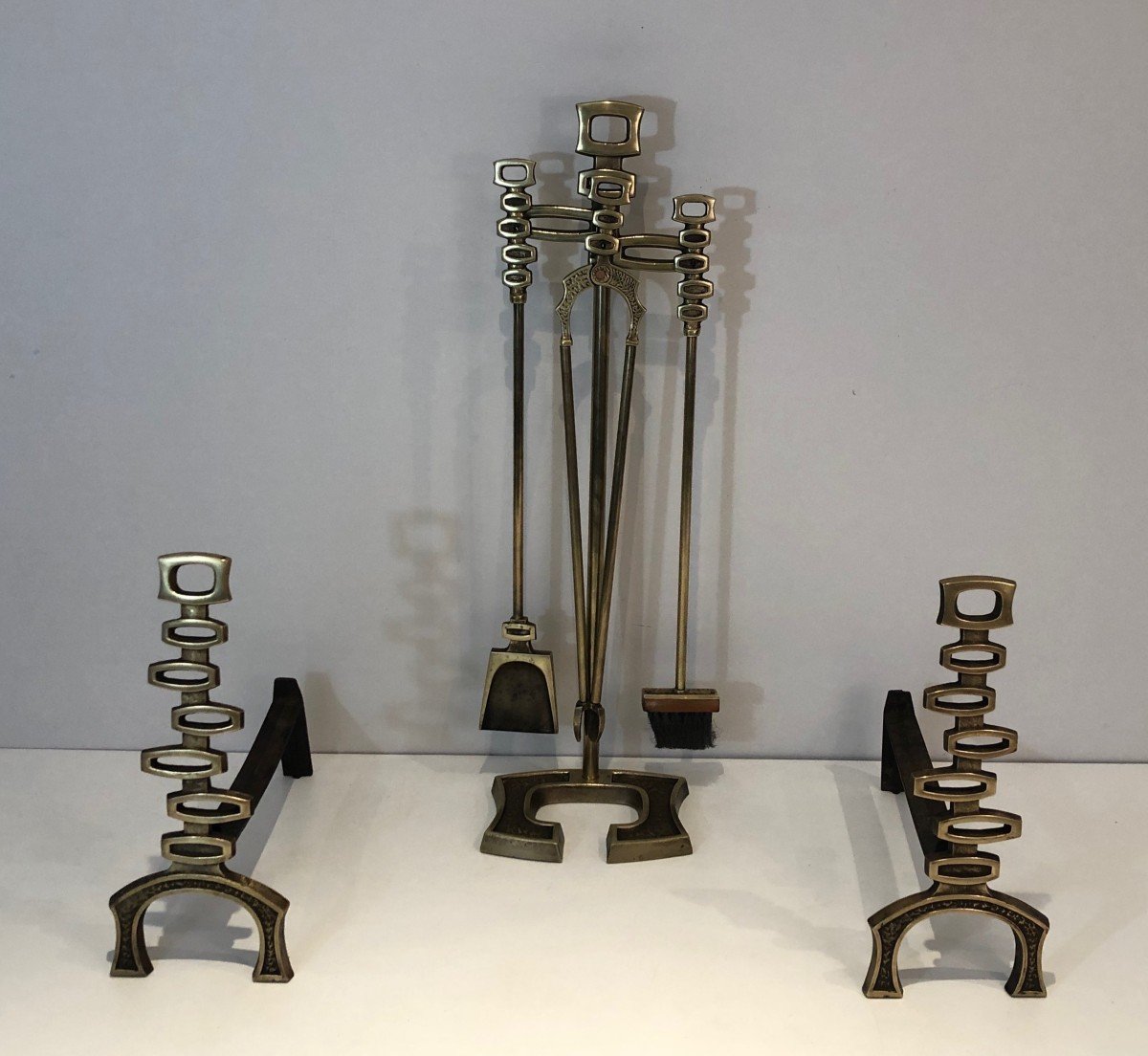 Modernist Brass Andirons And Fireplace Tools Set. Italian. Circa 1970