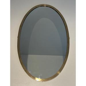 Neoclassical Style Oval Mirror In Brass. French Work In The Taste Of Maison Jansen