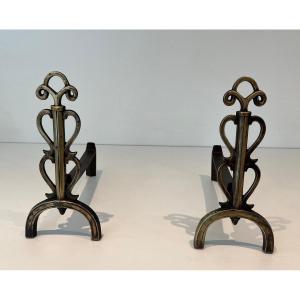 Pair Of Brass And Wrought Iron Andirons. French Work In The Style Of Raymond Subes. . Circa 1940