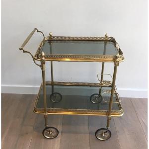 Neoclassical Style Rolling Table In Brass With Blue Glass Tops From Maison Jansen