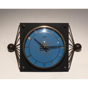 Lacquered Metal, Glass And Brass Clock. Circa 1950