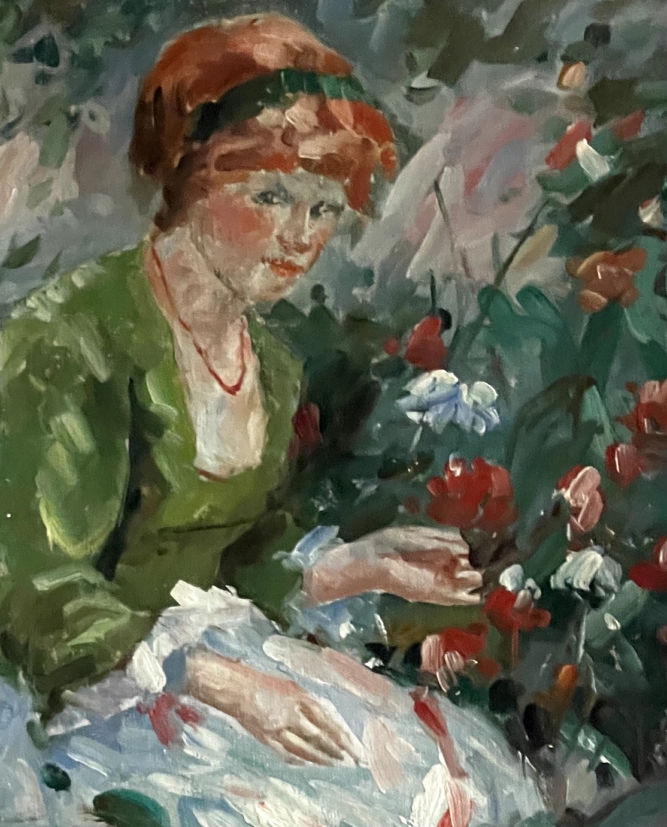 Jeune femme rousse au milieu des fleurs-photo-1