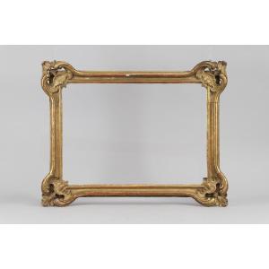 Cadre Louis XV en bois sculpté