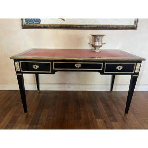 Bureau plat laqué noir de style Louis XVI, Maison Jansen , XXème siècle .