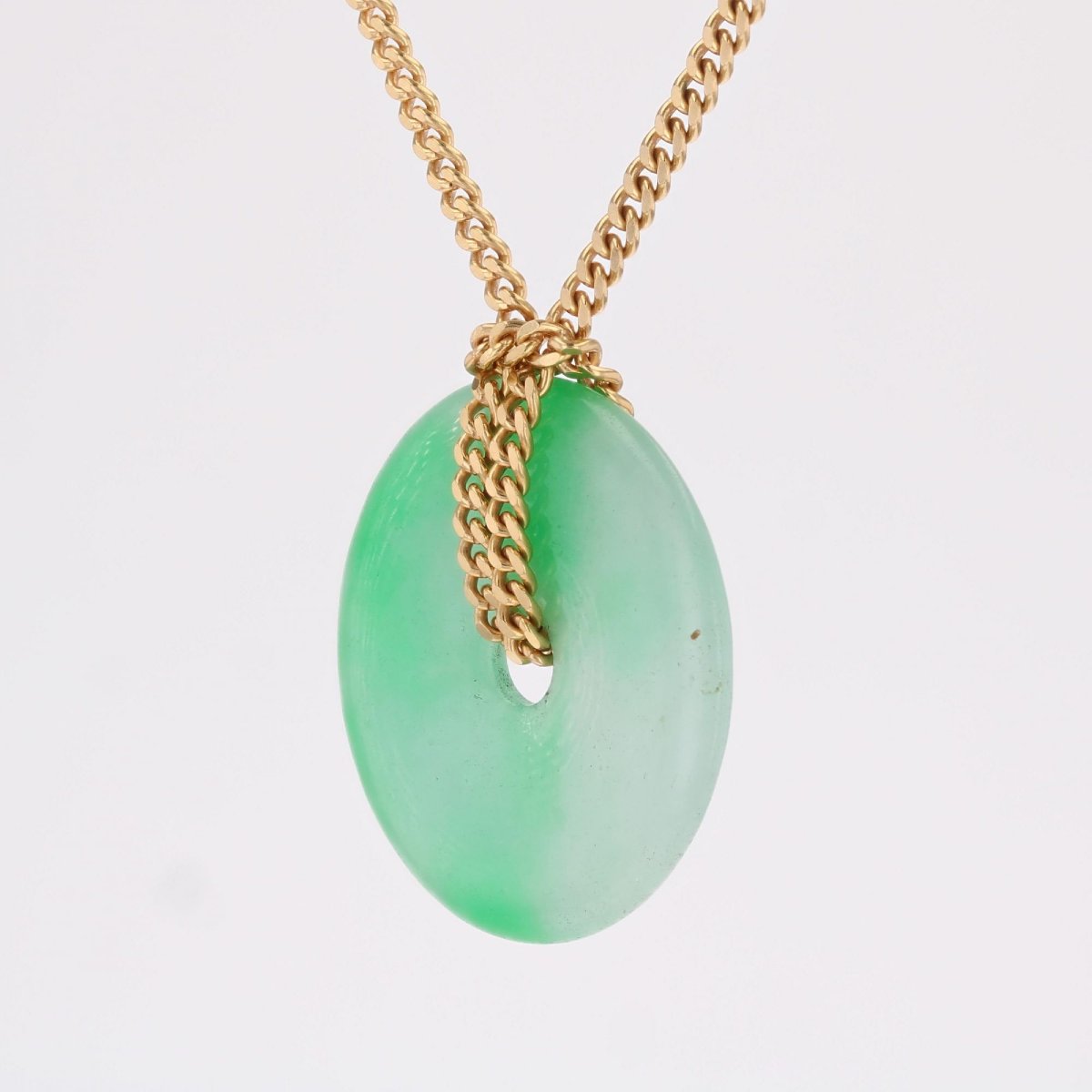 Gold Chain And Its Jade Disc-photo-1