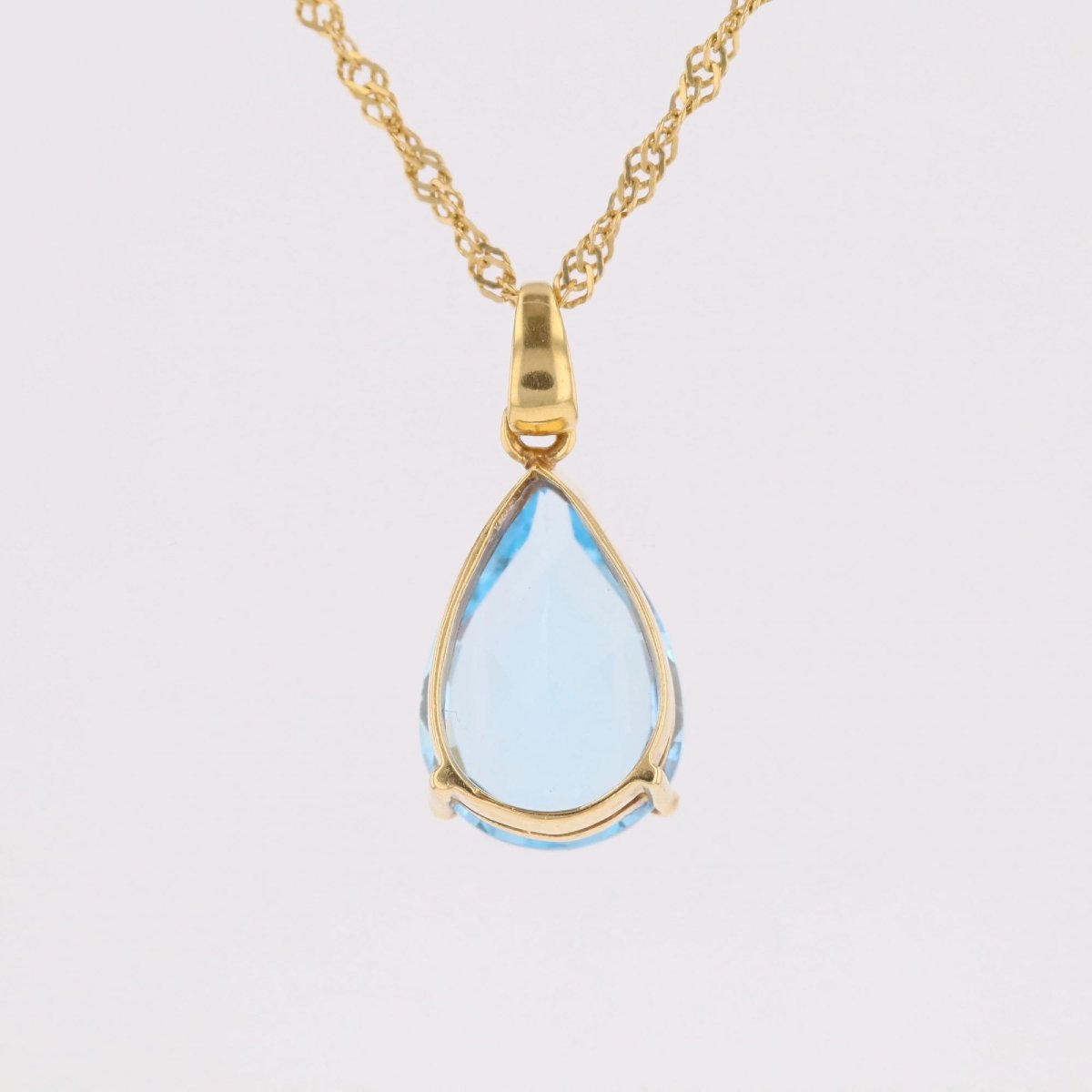 Pear-cut Topaz Pendant With Twisted Yellow Gold Chain-photo-6