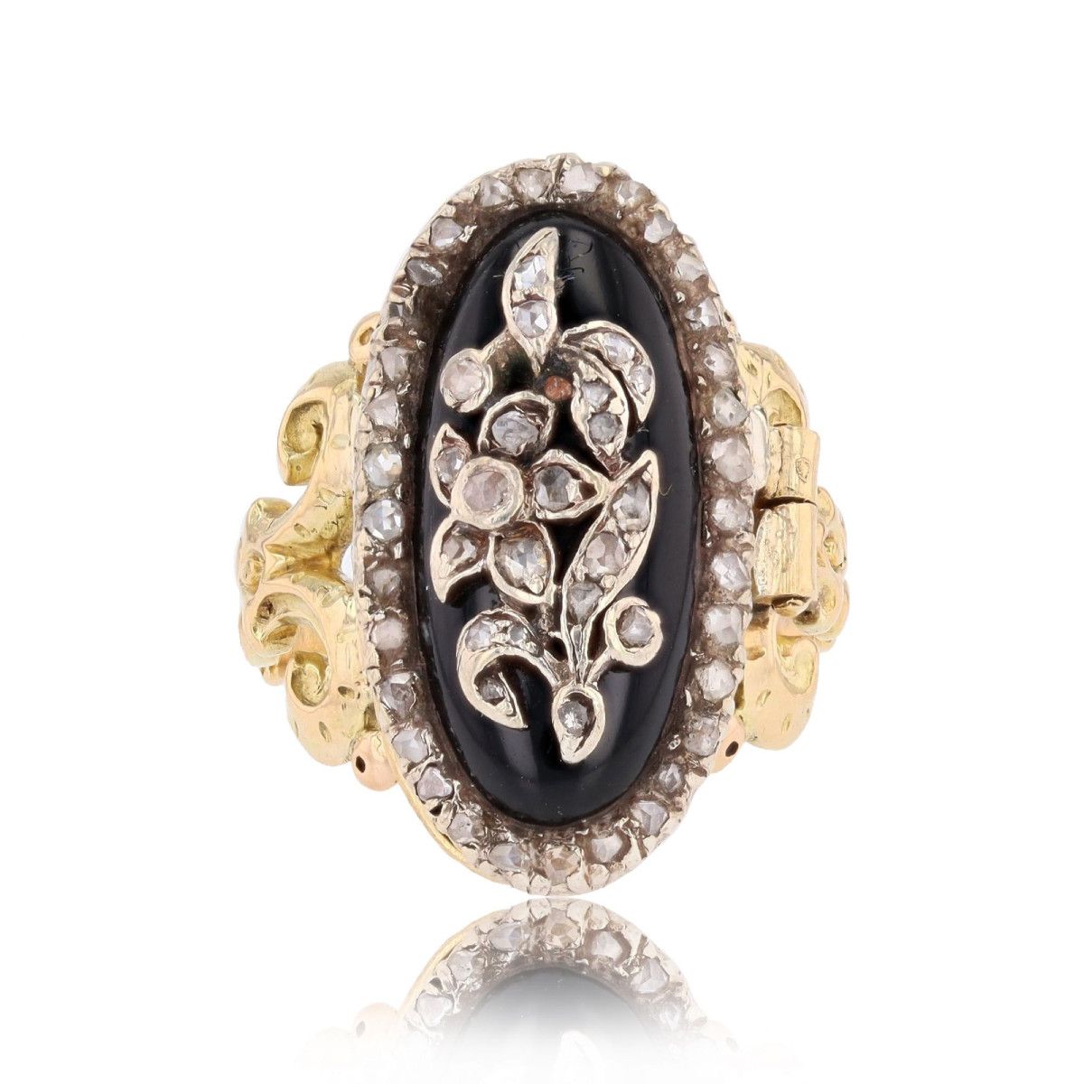 Bague ancienne à secret onyx diamants