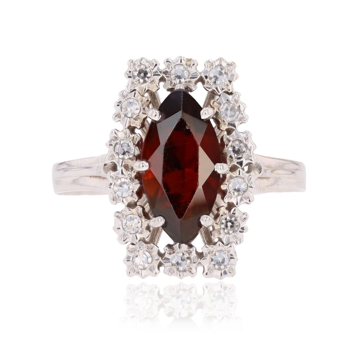 Vintage Ring With A Marquise-cut Garnet And Diamonds