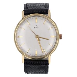 Ebel Men's Gold Watch And Its Leather Strap