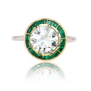 Bague ancienne solitaire diamant et ses émeraudes calibrées