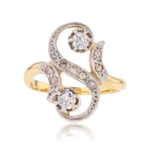 Bague ancienne volutes diamants