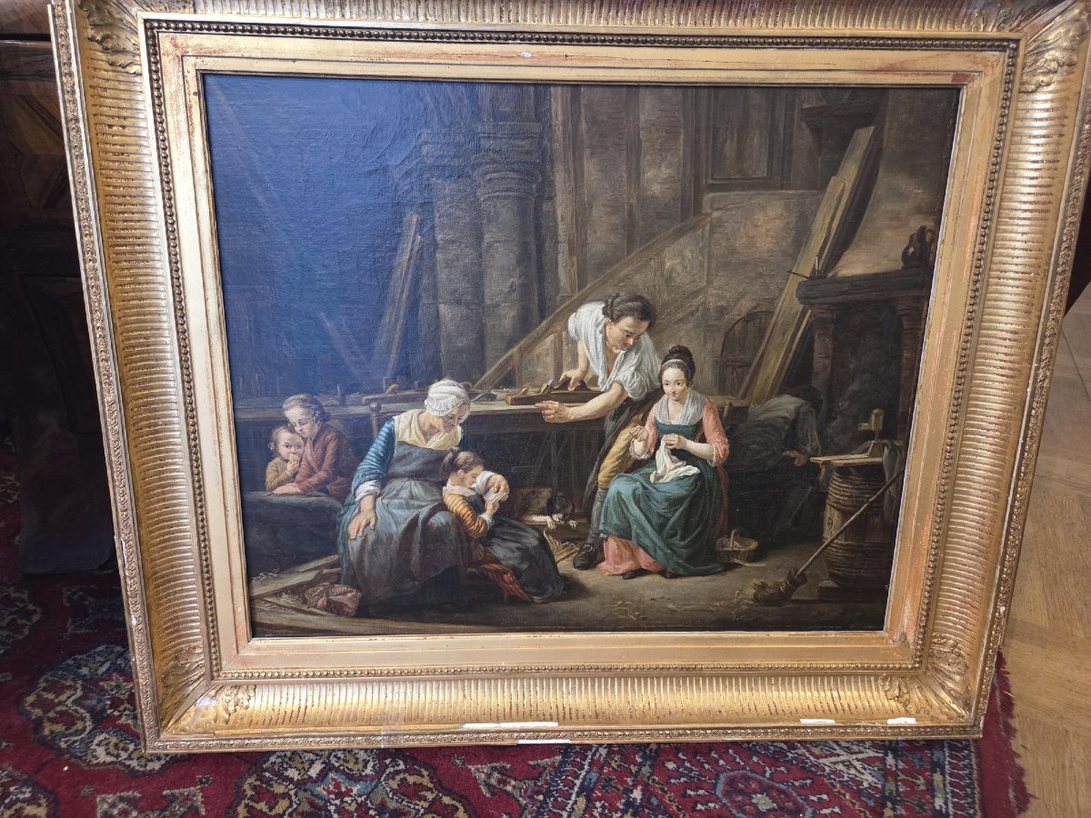 A Family Scene At A Cabinetmaker's Workshop