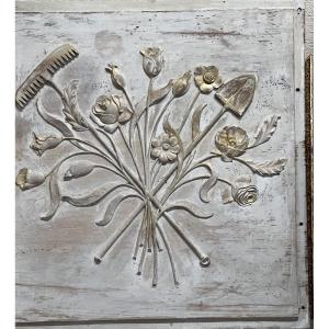 Decorative Carving On A Wooden Panel Depicting The Four Seasons