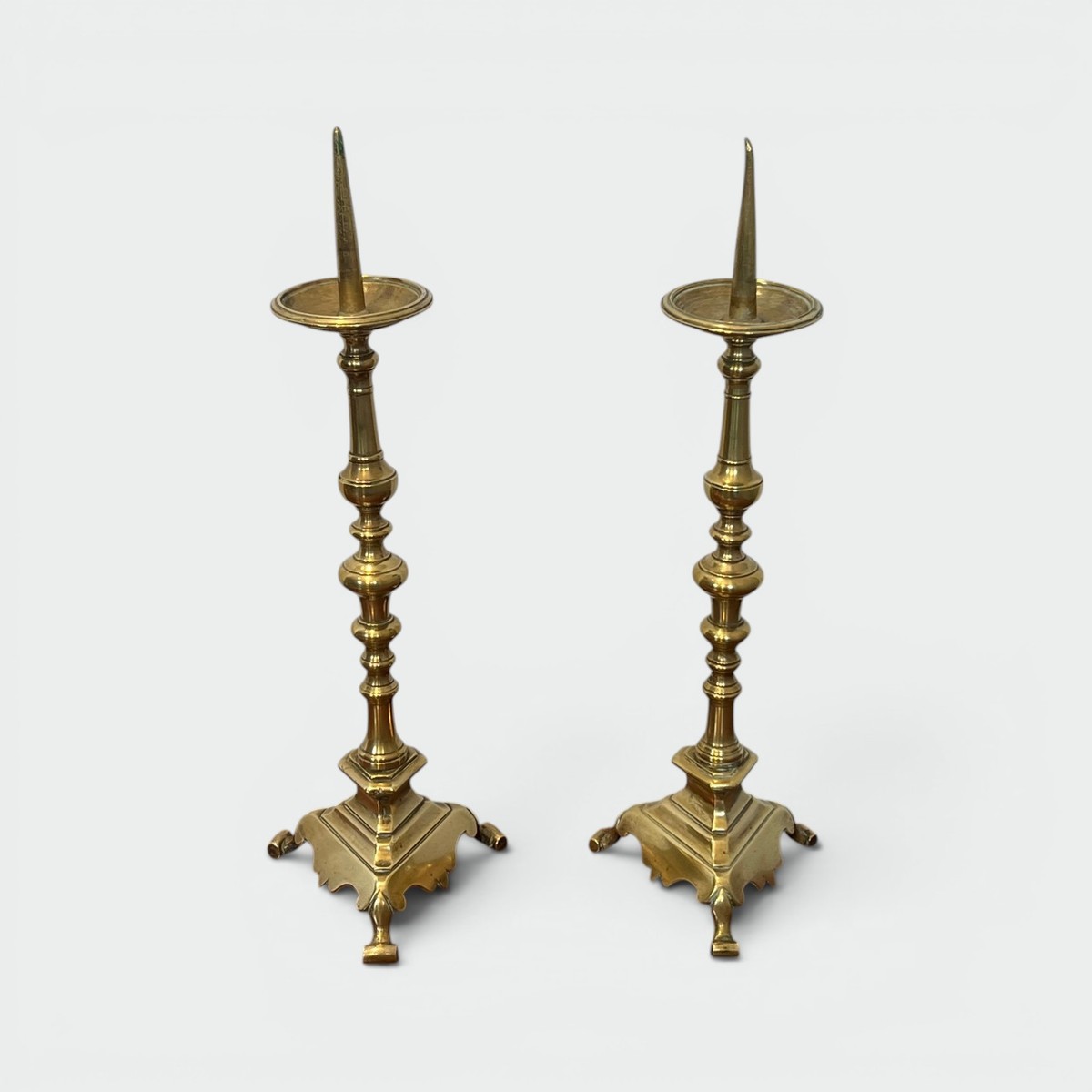 Pair Of Large Brass Altar Pricket Candlesticks With A Baluster Shaft And A Tripod Base. French 