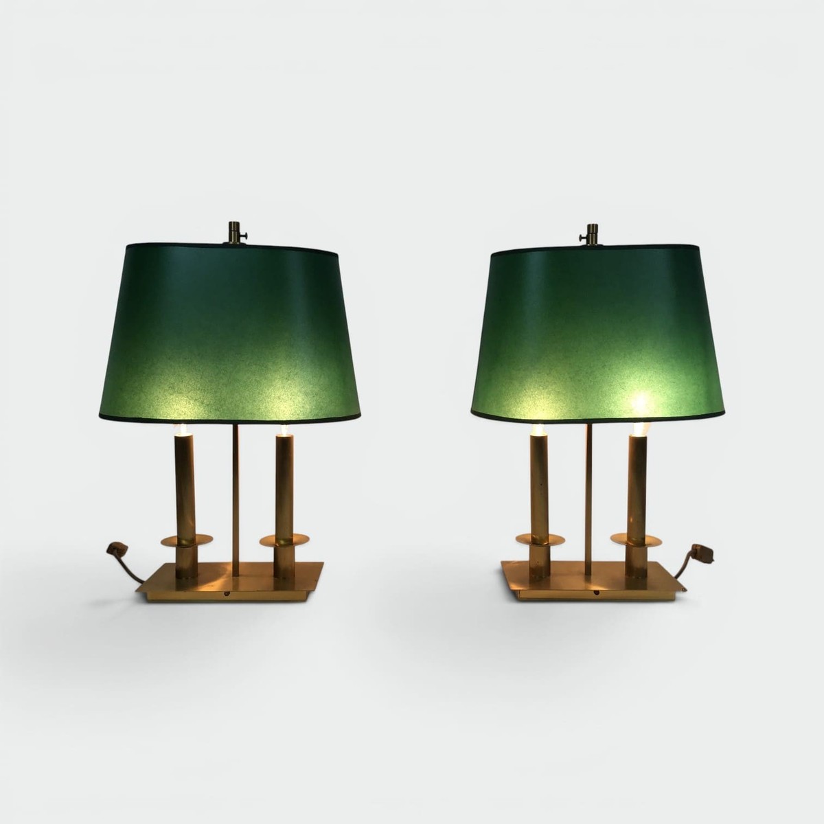 Pair Of Two-light Brass Table Lamps With Green Shades. French Work In The Manner Of Jacques Qui