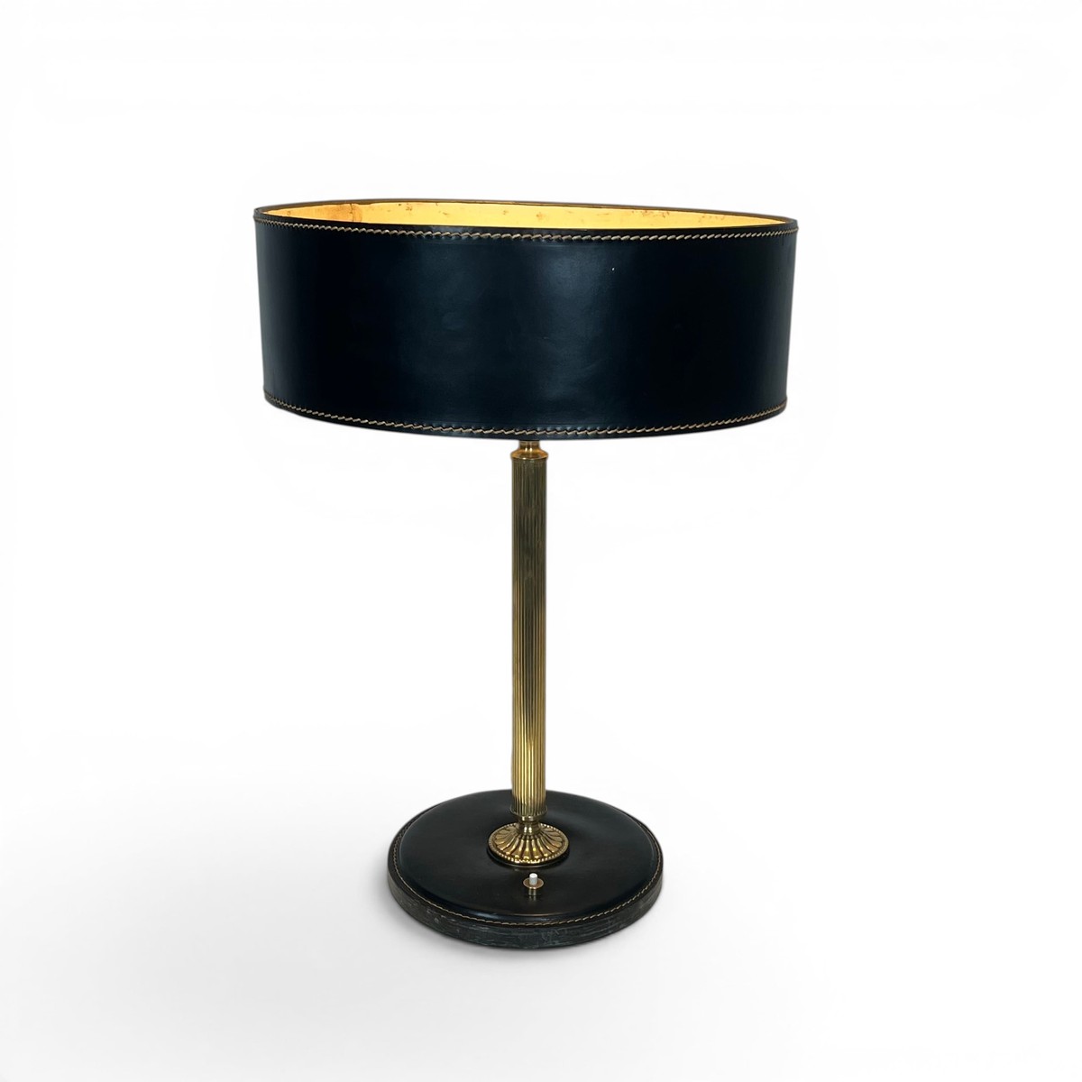 Table Lamp In Black Saddle-stitched Leather And Gilt Brass. In The Style Of Jacques Adnet. Circ
