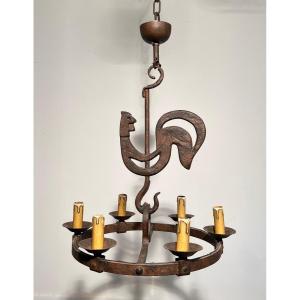 Chandelier With A Stylized Rooster In Wrought Iron. French Work By Jean Touret For Atelier Maro