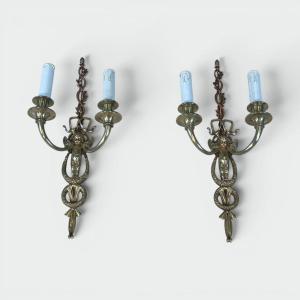 Pair Of Neoclassical Style Two-light Sconces In Brass And Copper Depicting A Winged Cherub. Fre
