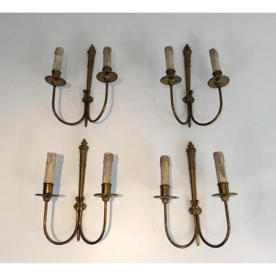 Suite Of Four Neoclassical Wall Sconces In Bronze.