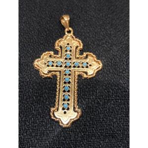 Croix en or et turquoises