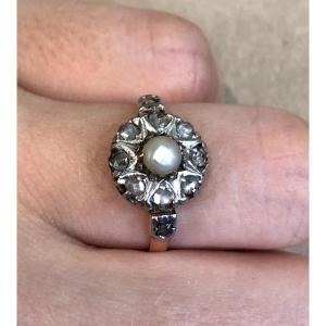 bague or fleur avec perle au centre 