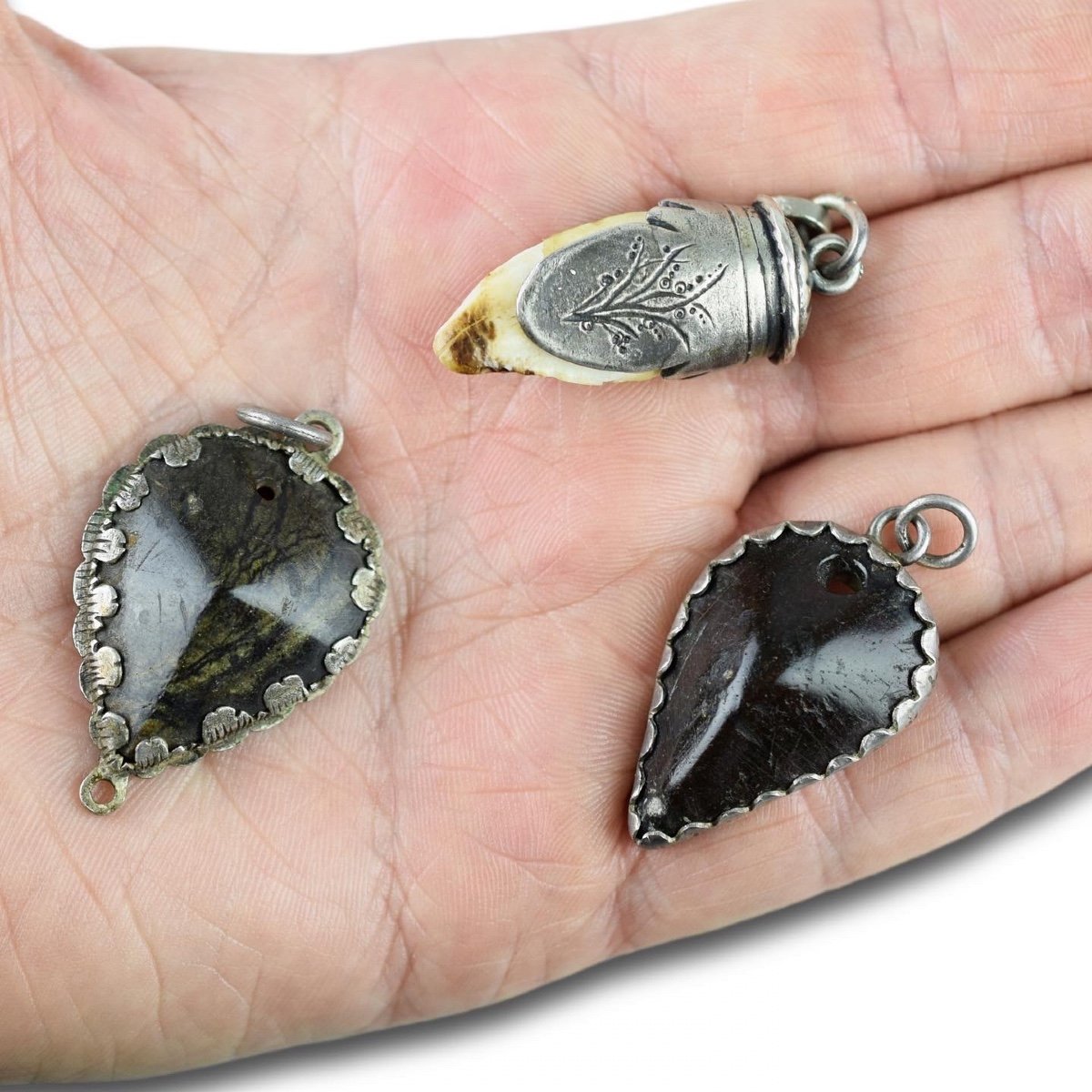 Three Silver Mounted Amulets. German, 17/18th Centuries.-photo-1