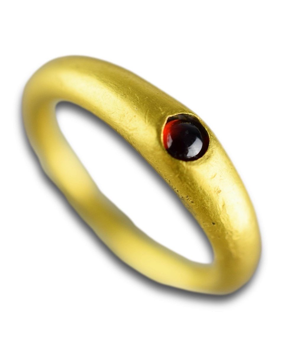 Ancient Gold Finger-ring Set With A Garnet. Roman, 3rd Century Ad.
