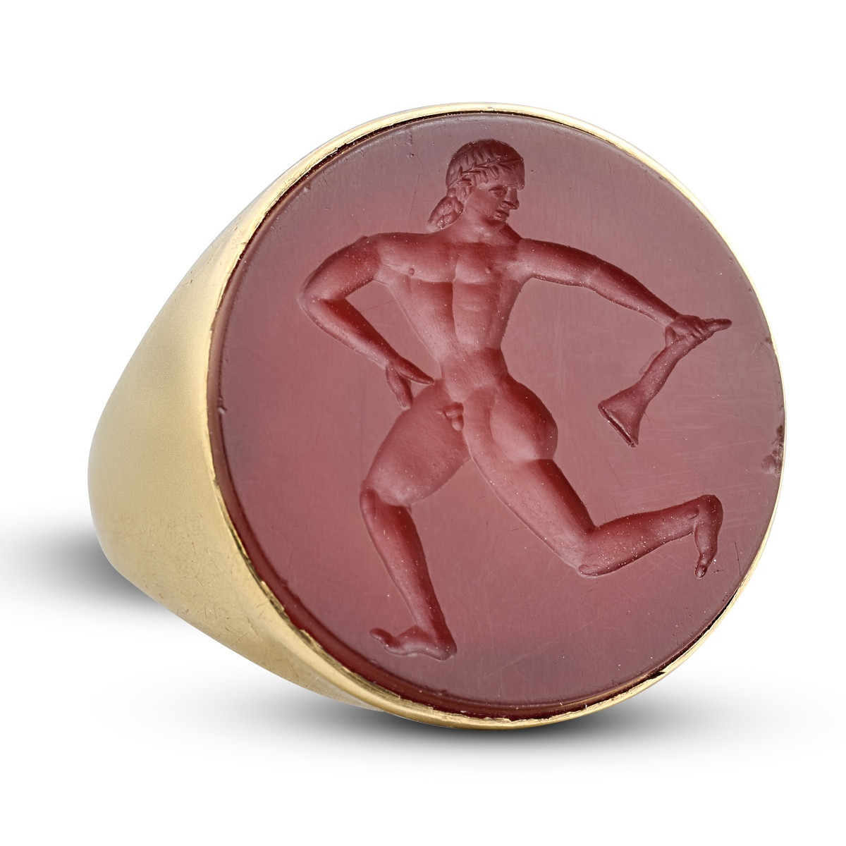 Etruscan Revival Gold Ring Set With A Carnelian Intaglio Of A Running Athlete.