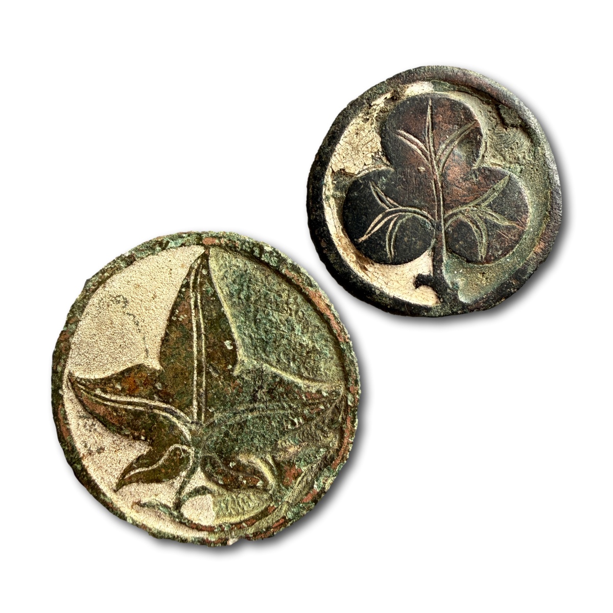 Two Champlevé Enamelled Bronze Roundels. English, 13th/14th Century.