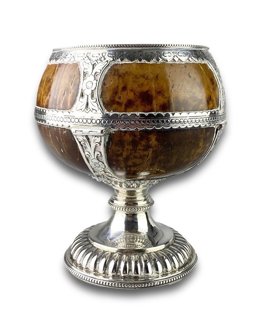 A Large Silver Mounted Coconut Goblet. Colonial, Mid-19th Century.